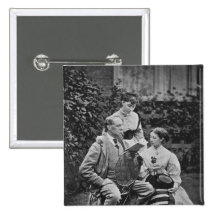Charles Dickens with two of his daughters Button
