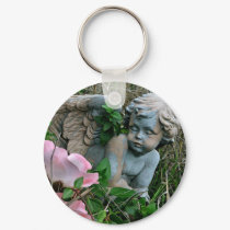 Cherub in the Grass keychains by paulnsheryl Cherub in the Grass keychains