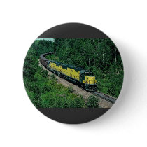 Chicago and Northwestern EMD No. 8028 with ore tra Button