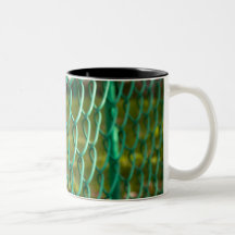 Child finger on fence coffee mug