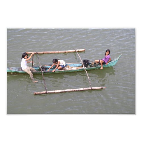 Children in a fishing boat, the Philippines