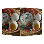 China, Hong Kong. Traditional Chinese teapot & 3 binders