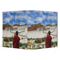 China, Tibet, Lhasa, Tibetan monk with Potala Vinyl Binder