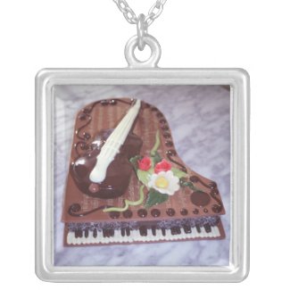 Chocolate grand piano necklace