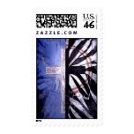 Christian cross. Between Darkness and Light Postage Stamp