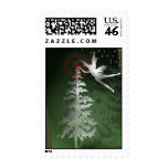 Christmas Angel lighting the tree stamp