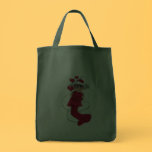 Christmas girl hugging bags