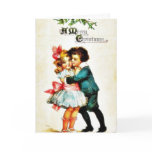 Christmas greeting with a boy hugs a girl