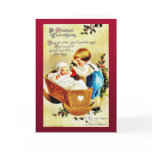 Christmas greeting with a child in a caddle and th