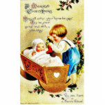 Christmas greeting with a child in a caddle and th