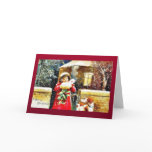 Christmas greeting with a girl opening her gift bo