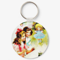 Christmas greeting with girls looking at the chris keychains
