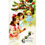 Christmas greeting with girls looking at the chris