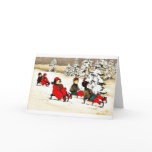 Christmas greeting with kids snow slading
