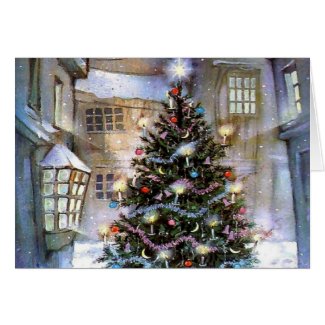 Brightly lit Christmas Tree in a snowy village square Christmas Card