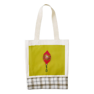 Chuchería rosada del navidad en un fondo amarillo bolsa tote zazzle HEART