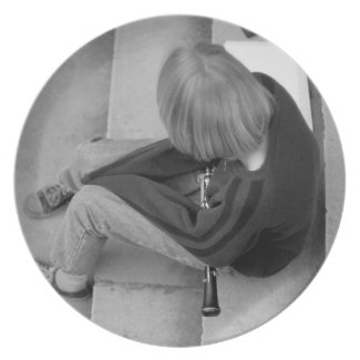 Clarinet Girl Player on Steps with Tuner and Music plate
