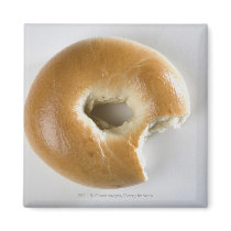 Close-up of a bagel fridge magnet