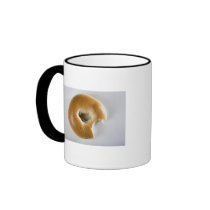 Close-up of a bagel coffee mugs
