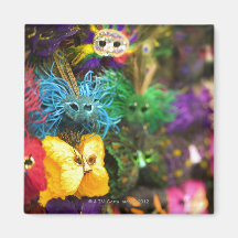Close-up of colorful miniature masks fridge magnets