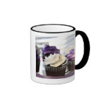 Close-up of cupcakes with selective focus on coffee mug