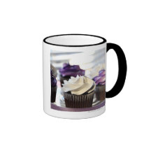 Close-up of cupcakes with selective focus on coffee mug