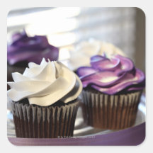 Close-up of cupcakes with selective focus on square stickers