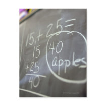 Close up of math problem on the chalkboard of an post card