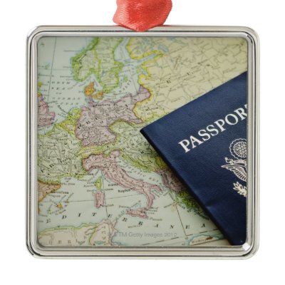 Close-up of passport lying on European map Christmas Ornaments