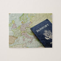 Close-up of passport lying on European map Jigsaw Puzzles