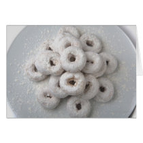 Close-up of powdered doughnuts in a plate cards