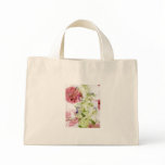 Close up of smashed flowers purple green red tote bags