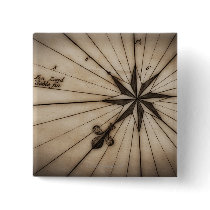 Close up of wind rose on antique map pin