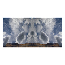 Cloud formations over desert picture card