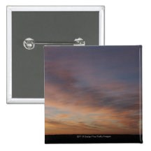 Clouds In An Orange Sky At Sunrise Button