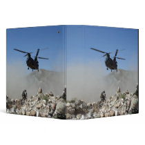 Clouds of dust kicked up by the rotor wash binders