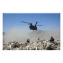 Clouds of dust kicked up by the rotor wash