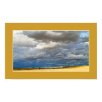 Cloudy desert posters