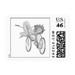 Clown riding bike backwards stamp
