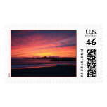 coastal sunset postage stamp