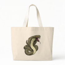 Cobra snake about to strike canvas bags
