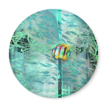 Collage angel fish swims in a school of blue fish magnets by eyecontact Collage angel fish swims in a school of blue fish magnets