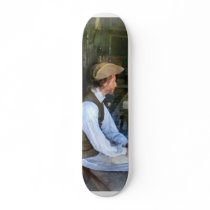 Colonial Man in Kitchen skateboards