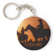 Colorado cowboys on horses keychain