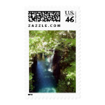 Colored leaves, waterfall and river postage stamps