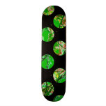 Colorful green circles on black skateboard