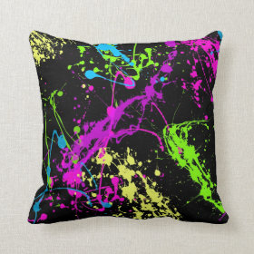 Colorful Neon Paint Splatters on Black Pillow