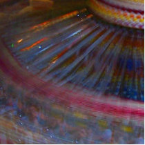 Colorful night fair ride action spinning shot photo sculptures