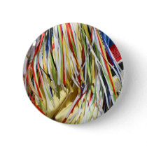 Colorful shimmer fringe close up button