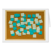 Cork board with sticky notes cards